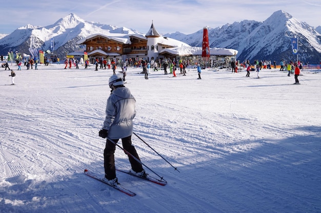 Mayrhofen, Austria - February 6, 2019: Man Skier in Penken ski resort in Zillertal in Tyrol. Austria in winter in Alps. Person at Alpine mountains with snow. Downhill fun. At Mayrhofen