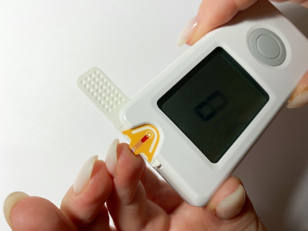 Measurement of blood sugar levels using a blood glucose meterf