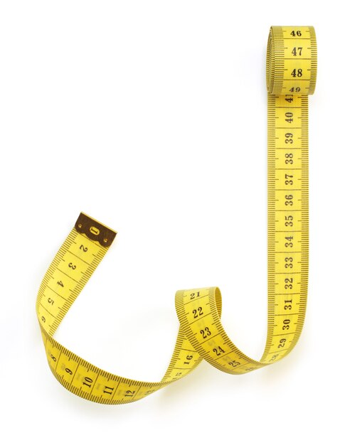 Premium Photo  Yellow measuring tape lies on a gray knitted fabric