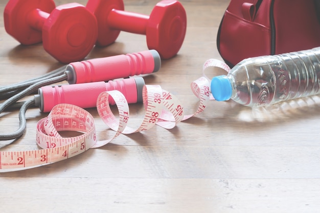 Measuring-tape and sport equipments for beauty woman, Healthy and Diet concept