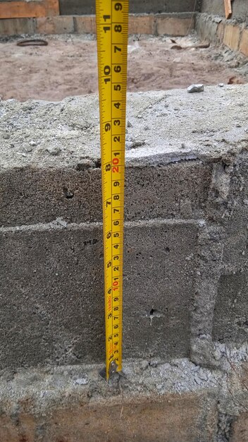 Photo measuring tape tool on a construction site