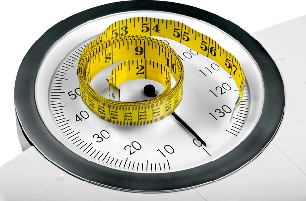 A Measuring Tape on a Weight Scale