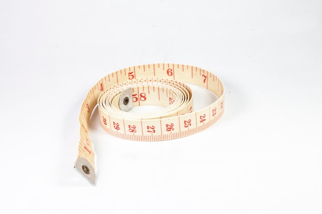 Measuring tape on white background