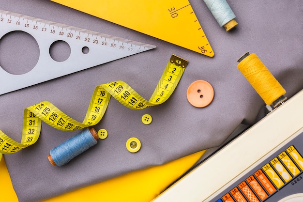 measuring tape with thread and fabric