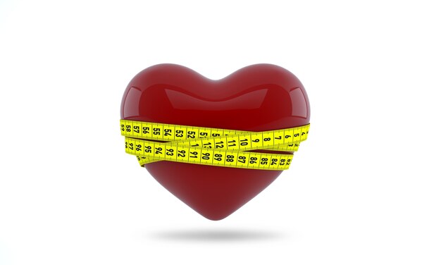 Photo measuring tape wrapped around a red heart as a symbol of diet