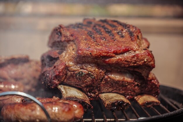 Meat cooking on the barbecue.