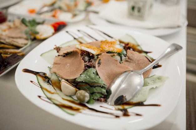 Meat dish on a table in a restaurant