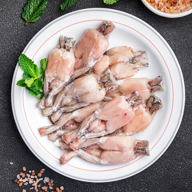 meat frog leg frozen food meal food snack on the table copy space food background rustic top view