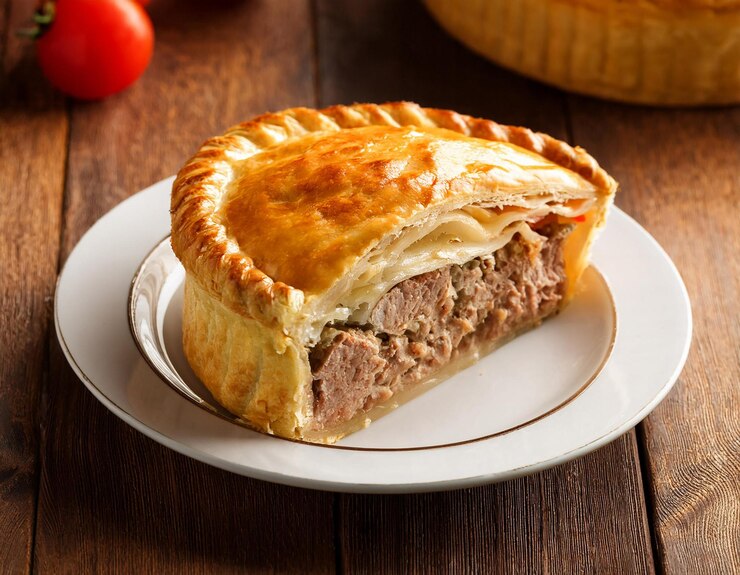 Photo meat pie over wood background ai