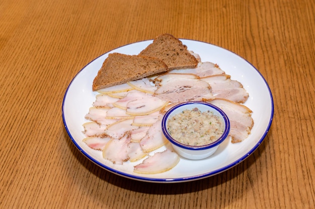 meat plate with bread and sauce