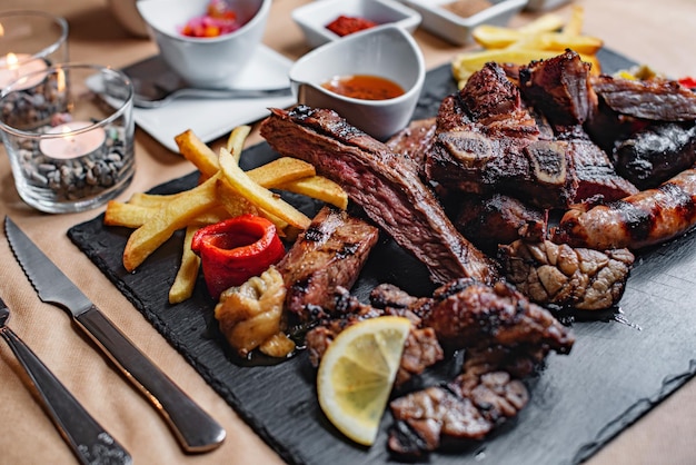 Meat platter cooked on the grill in Argentine style