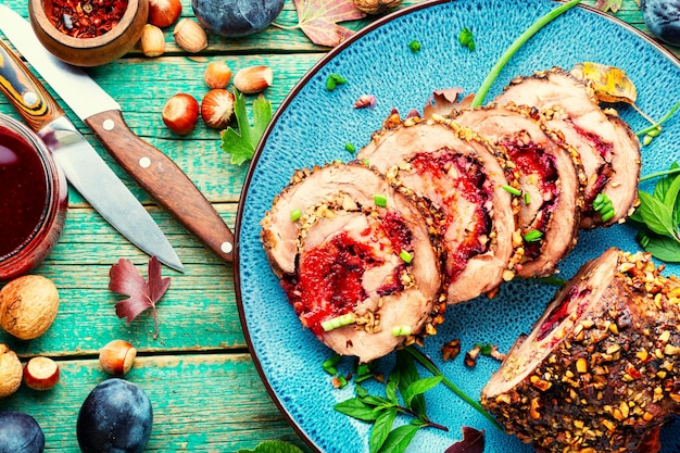 Meat roulade with plum and nut