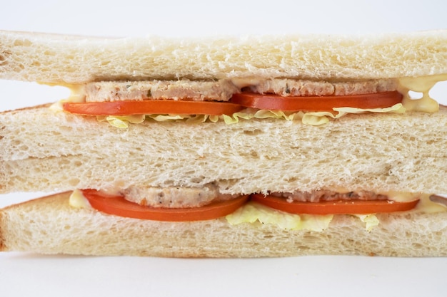 Meat sandwich with fresh tomato and cabbage