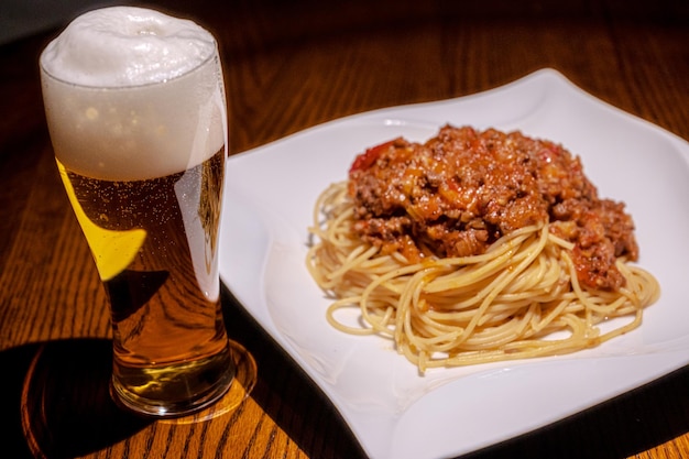 Meat sauce spaghetti and beer