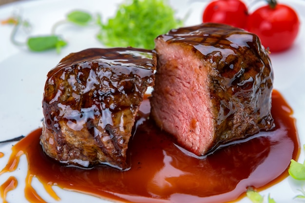 Meat steak in a sauce