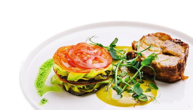 Meat steak with grilled vegetables on plate