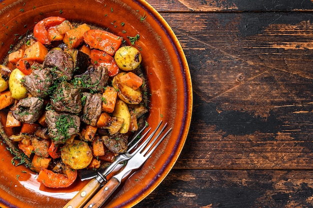 Meat stew in cooking pot