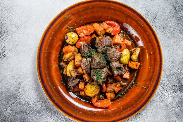 Meat stew in cooking pot