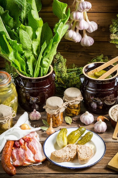 Meat with vegetables on wooden table