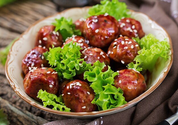 Meatballs with beef in sweet and sour sauce