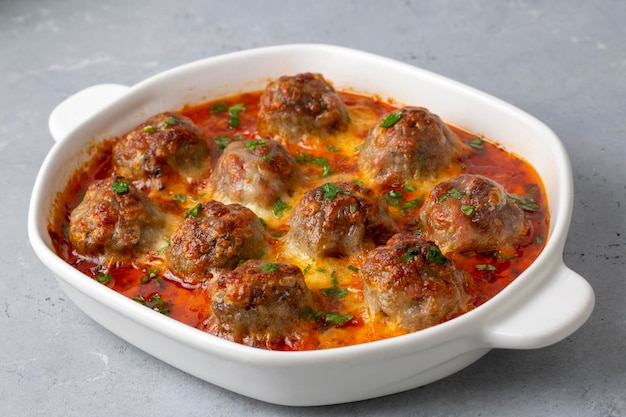 Photo meatballs with cheddar in the oven turkish name firinda kasarli kofte