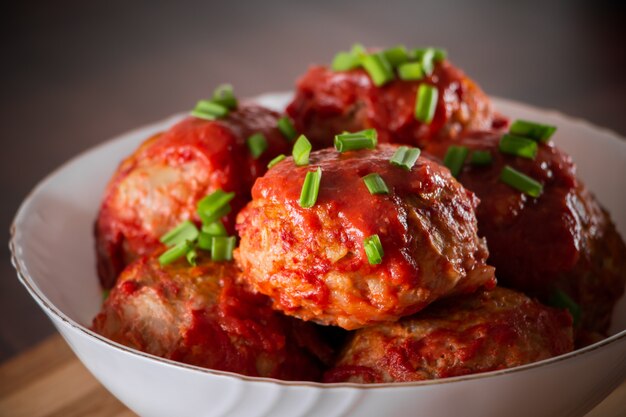 Meatballs with tomato sauce and herbs