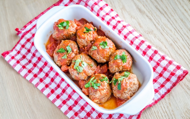 Meatballs with tomato sauce and parmesan
