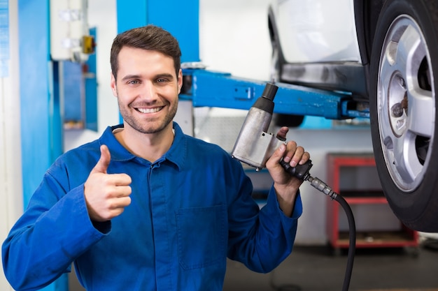 Mechanic adjusting the tire wheel