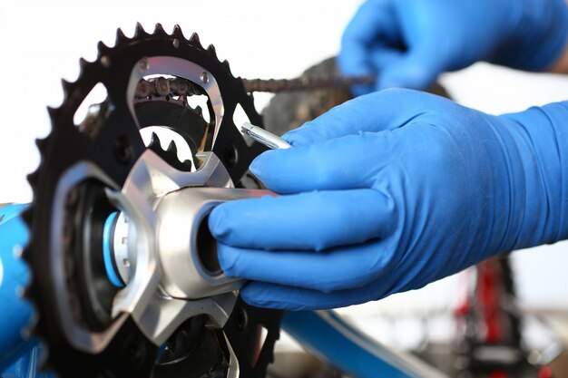 Mechanic fixing mountain bike