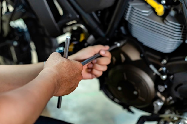 Mechanic repairing a motorcycle