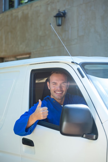 Mechanic sitting in his car