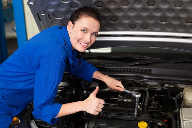 Mechanic smiling at the camera