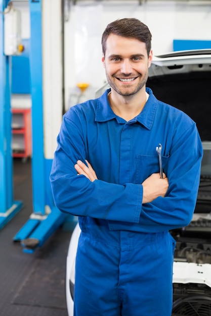 Mechanic smiling at the camera