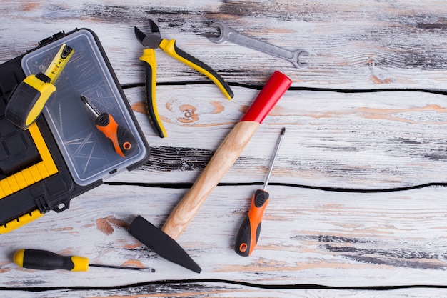 Mechanic tool set on wooden background