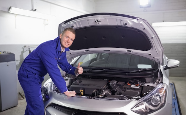 Mechanic with his thumb up