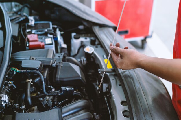 Mechanic working car maintenance