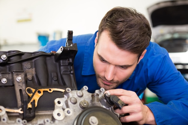 Mechanic working on an engine