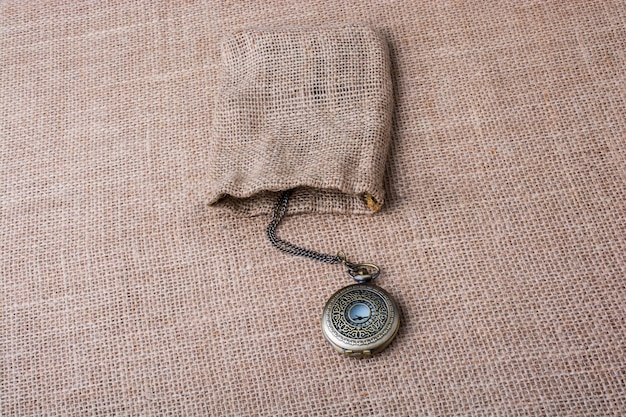 Mechanical pocket watch on a sack