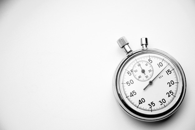 Mechanical stopwatch on a white background.