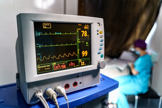 Mechanical ventilation equipment. Pneumonia diagnosting. Ventilation of the lungs with oxygen. Monitor with results.