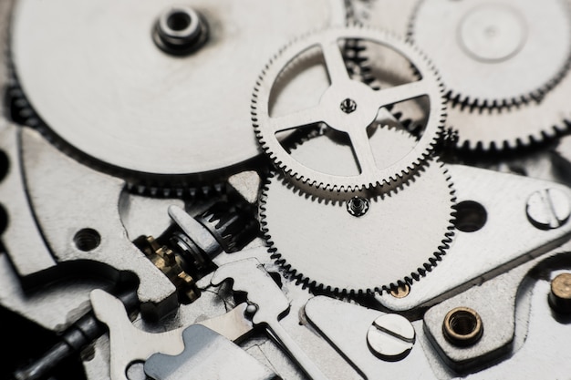 Mechanisch horloge / Gear Clock. Sluit omhoog radertjes en toestellen binnen klokachtergrond