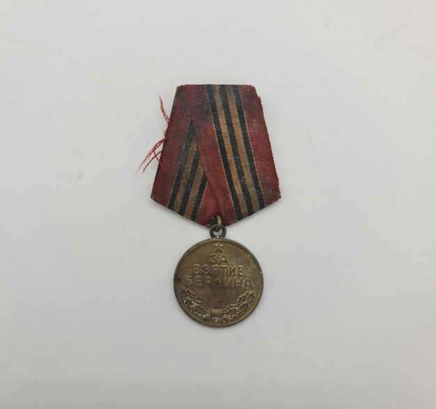 A medal from the soviet union is on a white background.