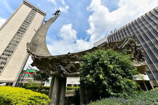 Medellin Colombia Apr 15 2022 Alpujarra Administrative Center urban complex government buildings and Monument to the Race in Medellin Colombia