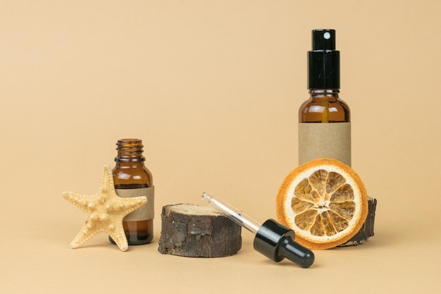 Medical bottles and accessories for traditional medicine on a beige background Cosmetics and medicinal products based on natural minerals