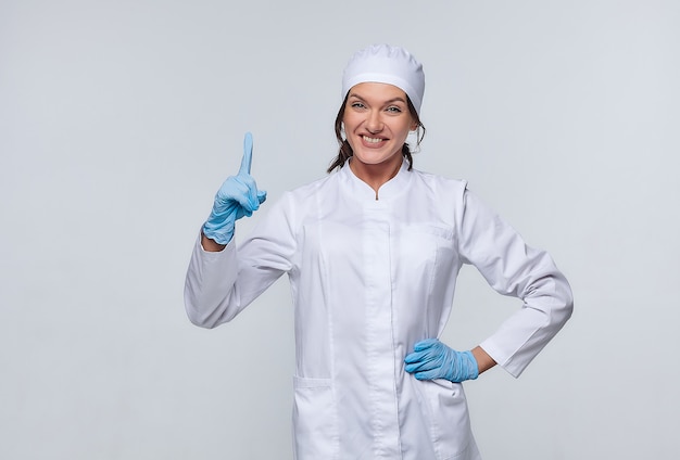 Medical concept of a female doctor in a white coat with a stethoscope