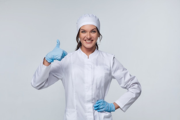 Medical concept of a female doctor in a white coat with a stethoscope