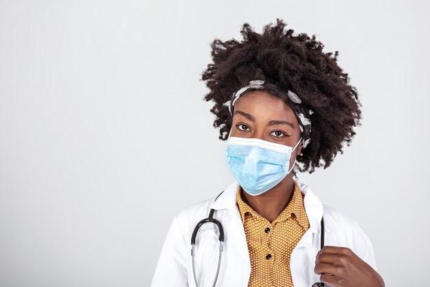 Medical concept of young beautiful female doctor in white coat