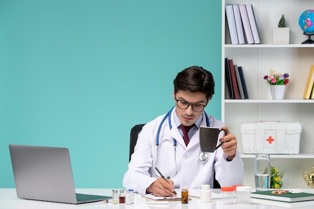 Medical cute smart doctor in lab coat working remotely on computer working hard