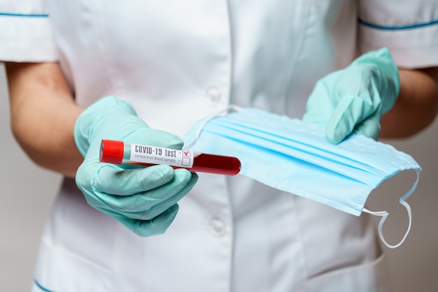 medical doctor nurse woman wearing latex gloves