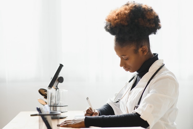 Medical doctor woman working at laboratory